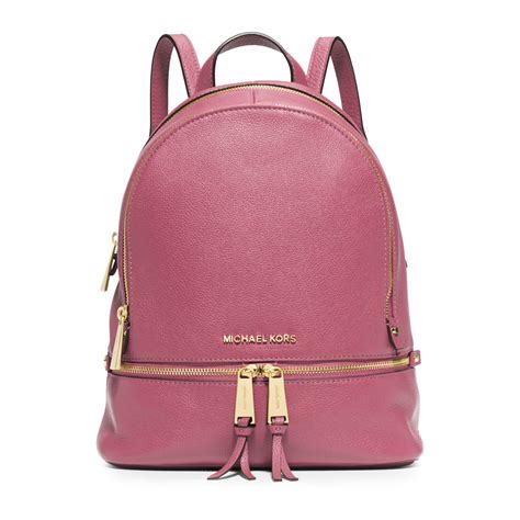 purple michael kors backpack.